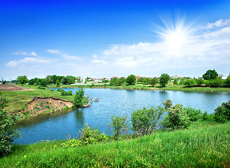 Image showing Sun over river