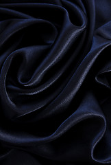 Image showing Smooth elegant black silk as background 