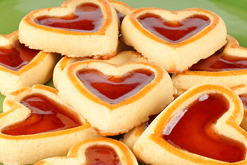 Image showing Heart shaped cherry jam cookies