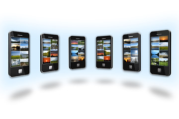 Image showing Modern mobile phones with different images