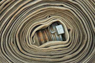 Image showing Old rolled fire hose