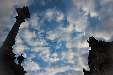 Image showing top of church domes and column