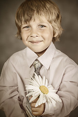 Image showing boy wearing classic suit with flowers