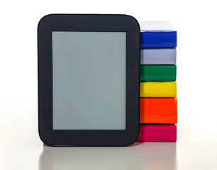 Image showing Electronic book reader with hard cover books