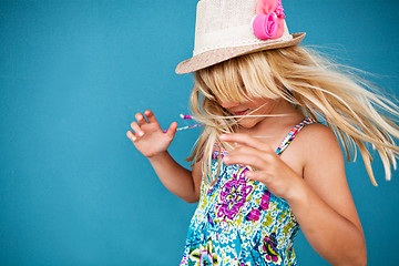 Image showing Playful cute young girl