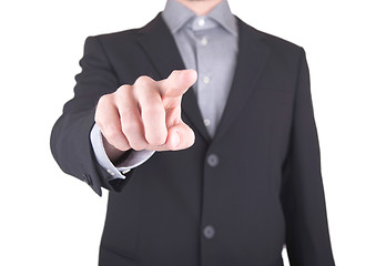 Image showing Business man in suit pushing a button