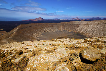 Image showing vulcanic timanfaya  rock stone and summer in los volcanes lanzar