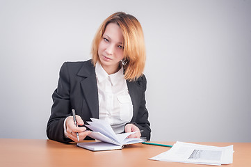 Image showing Young red-haired businesswoman