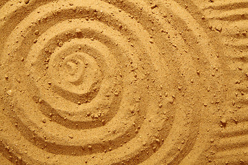 Image showing circles in the sand