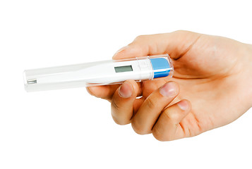 Image showing Man's hand with a thermometer