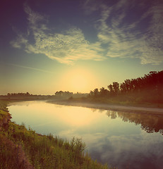 Image showing sunrise over river - vintage retro style