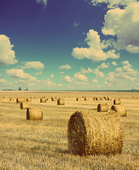 Image showing bales of straw in field - vintage retro style