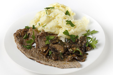 Image showing Veal and sauteed mushroom meal