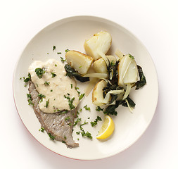 Image showing Veal with potatoes and chard from above