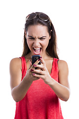 Image showing Yelling to a cellphone 