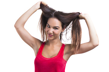 Image showing Woman grabbing her hair