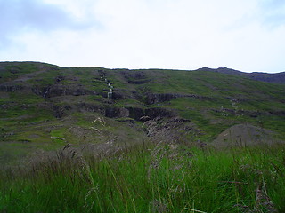 Image showing under the hillside