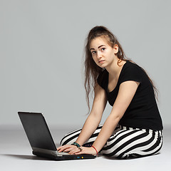 Image showing Teenager girl with laptop