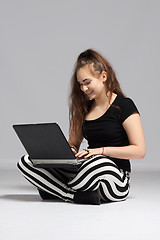 Image showing Teenager girl with laptop