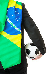 Image showing Back view of businessman hold soccer ball with brazil flag