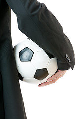 Image showing Back view of businessman hold soccer ball