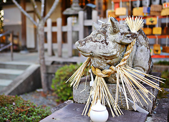 Image showing Stone cow Statue in Japanese temple