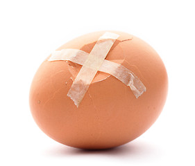 Image showing Crack egg with plaster