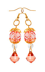 Image showing Earrings in red glass with gold elements. white background 