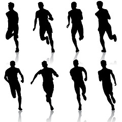 Image showing Set of silhouettes. Runners on sprint, men. vector illustration.