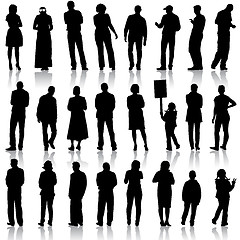 Image showing Black silhouettes of beautiful mans and womans on white backgrou