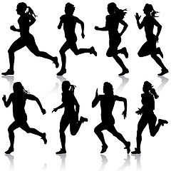 Image showing Set of silhouettes. Runners on sprint, women. vector illustratio