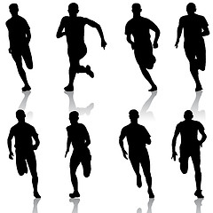 Image showing Set of silhouettes. Runners on sprint, men. vector illustration.