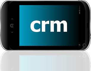 Image showing crm word on smart mobile phone, business concept