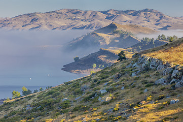 Image showing mountain lake in a fog