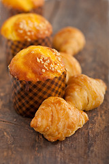 Image showing fresh baked muffin and croissant mignon