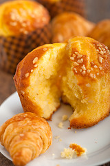 Image showing fresh baked muffin and croissant mignon