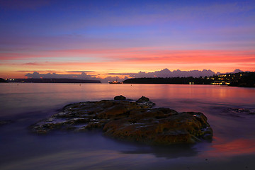 Image showing Dawn glow of the sunrise at Edwards Beach