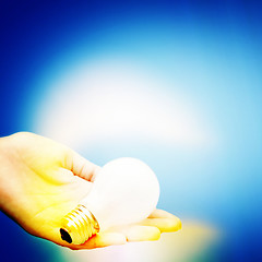 Image showing Background with lit lightbulb