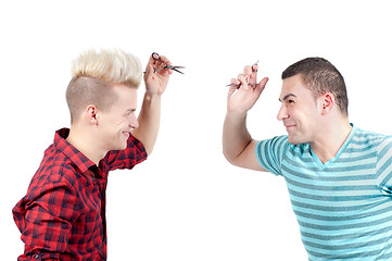 Image showing Two men with scissors aiming each other