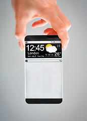 Image showing Smartphone with transparent screen in human hands.