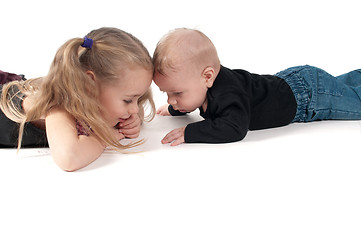 Image showing Two children touching to each other's foreheads