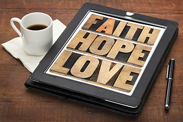 Image showing faith, hope and love on digital tablet