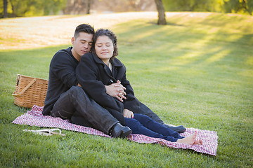 Image showing Pregnant Hispanic Couple in The Park Outdoors