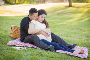 Image showing Pregnant Hispanic Couple in The Park Outdoors