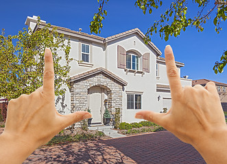 Image showing Female Hands Framing Beautiful House