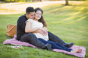 Image showing Pregnant Hispanic Couple in The Park Outdoors