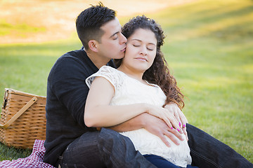 Image showing Pregnant Hispanic Couple in The Park Outdoors