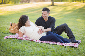 Image showing Pregnant Hispanic Couple in The Park Outdoors