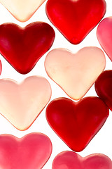 Image showing Brightly coloured red gums hearts