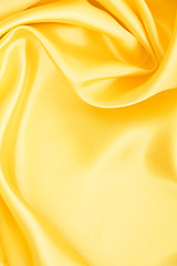 Image showing Smooth elegant golden silk as background 